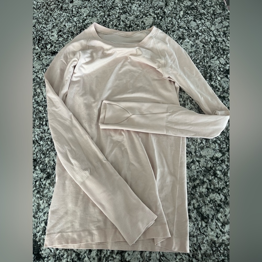 Light pink Lululemon Swiftly Tech